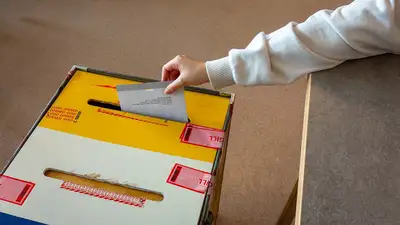 Ballot dropped into ballot box 2024 Swedish EU election at Stångenässkolan, Brastad 2