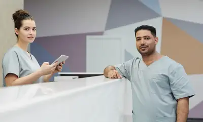 Staff at a medical clinic reception desk